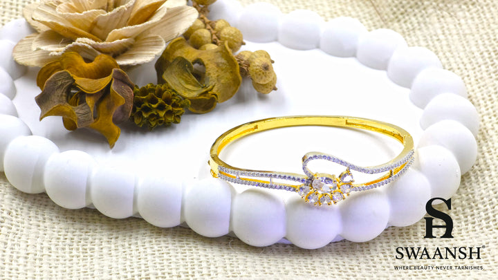 Gold floral bracelet with oval and pear-cut crystals set on dual crystal-lined bands – Swaansh