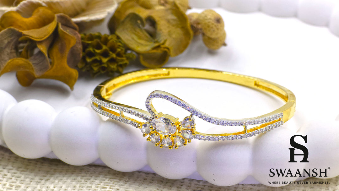 Gold floral bracelet with oval and pear-cut crystals set on dual crystal-lined bands – Swaansh