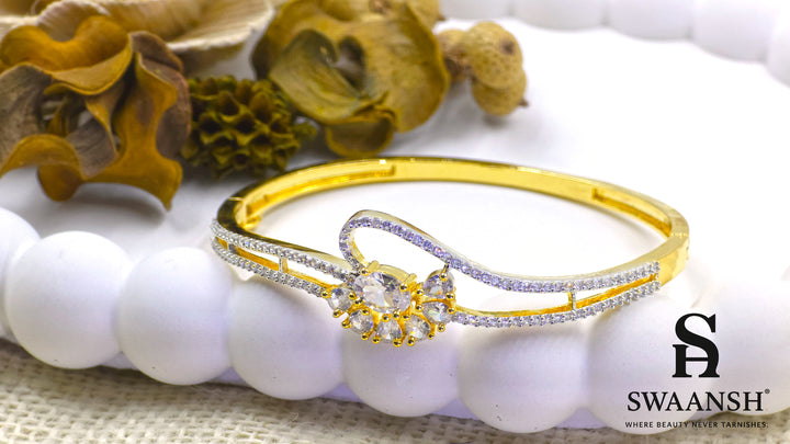 Gold floral bracelet with oval and pear-cut crystals set on dual crystal-lined bands – Swaansh