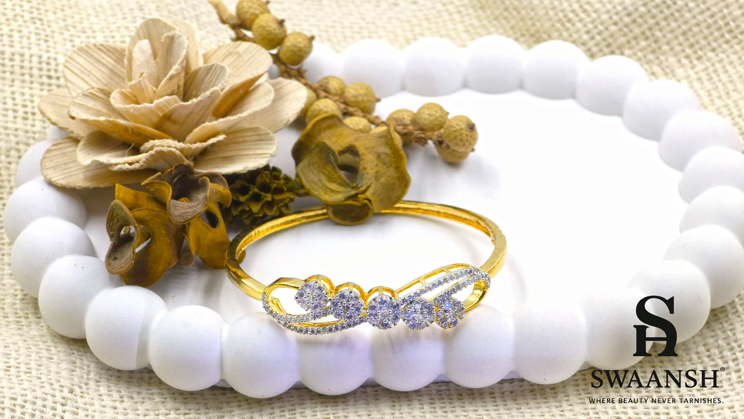 Gold bracelet with floral crystal cluster and dual micro-studded bands – Swaansh