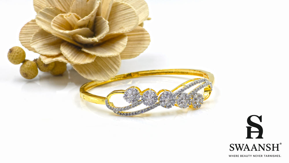 Gold bracelet with floral crystal cluster and dual micro-studded bands – Swaansh