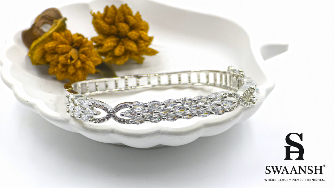Silver square bracelet with three rows of marquise-cut zirconia and side swirl motifs – Swaansh
