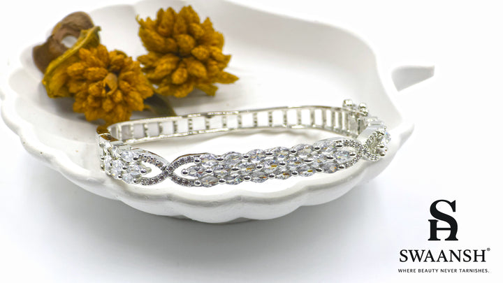 Silver square bracelet with three rows of marquise-cut zirconia and side swirl motifs – Swaansh