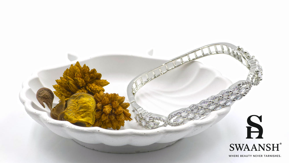 Silver square bracelet with three rows of marquise-cut zirconia and side swirl motifs – Swaansh