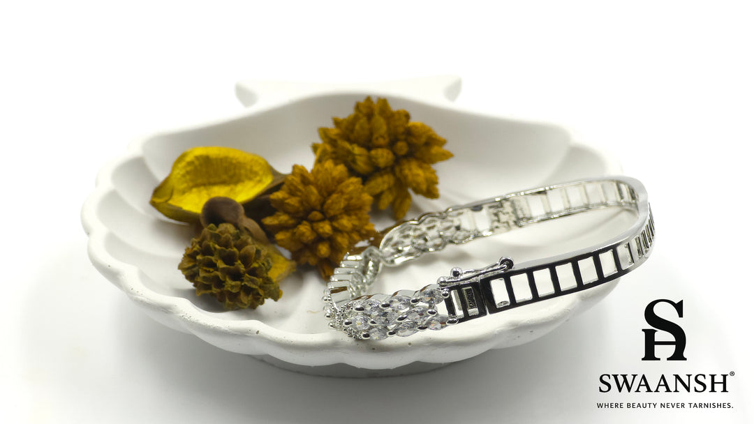 Silver square bracelet with three rows of marquise-cut zirconia and side swirl motifs – Swaansh