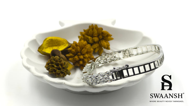 Silver square bracelet with three rows of marquise-cut zirconia and side swirl motifs – Swaansh