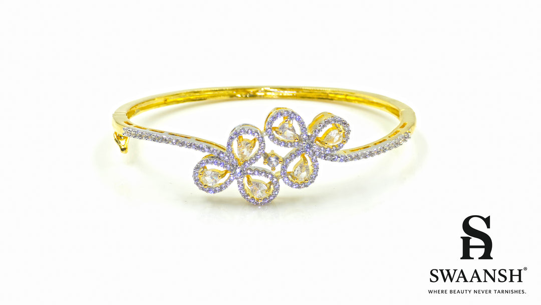 Gold bracelet with four petal-shaped crystal motifs and dual micro-studded bands – Swaansh