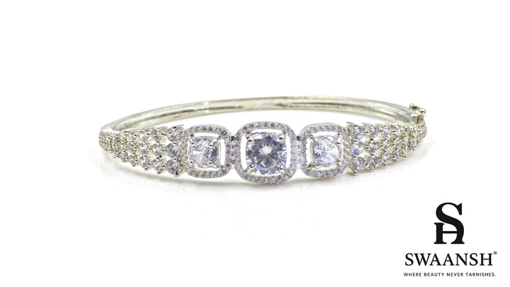 Anti-tarnish silver bracelet with three cushion-cut CZ stones in halo setting, tapering design – Swaansh