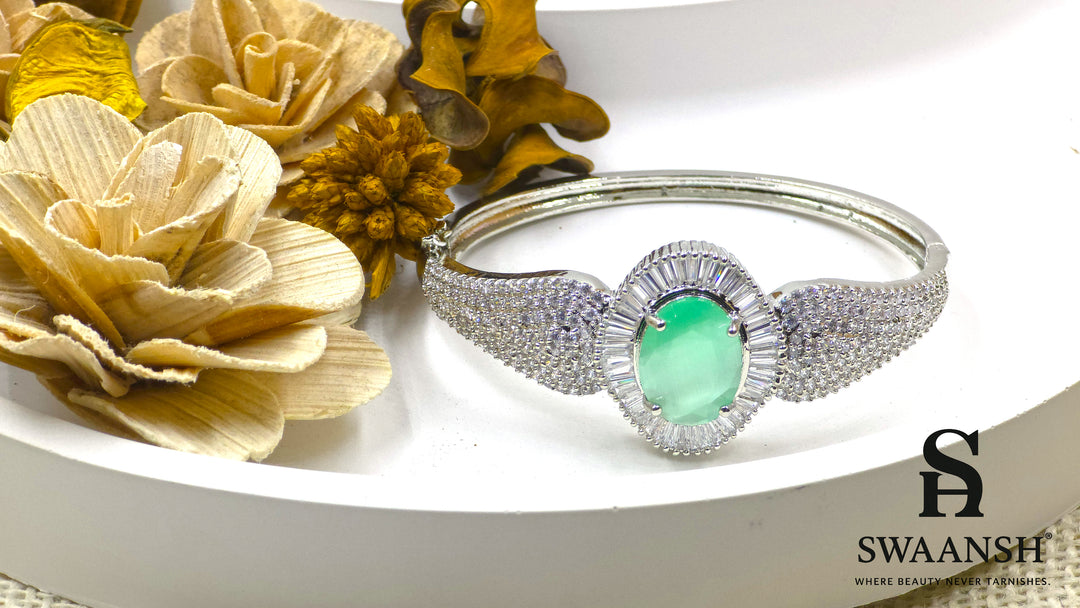 Silver-toned bracelet with oval green stone, surrounded by baguette-cut CZs – BPR111 anti-tarnish festive jewellery by Swaansh