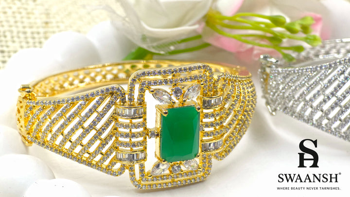 Gold bracelet with rectangular emerald green centre and structured CZ grid design – BPR114 luxury piece by Swaansh