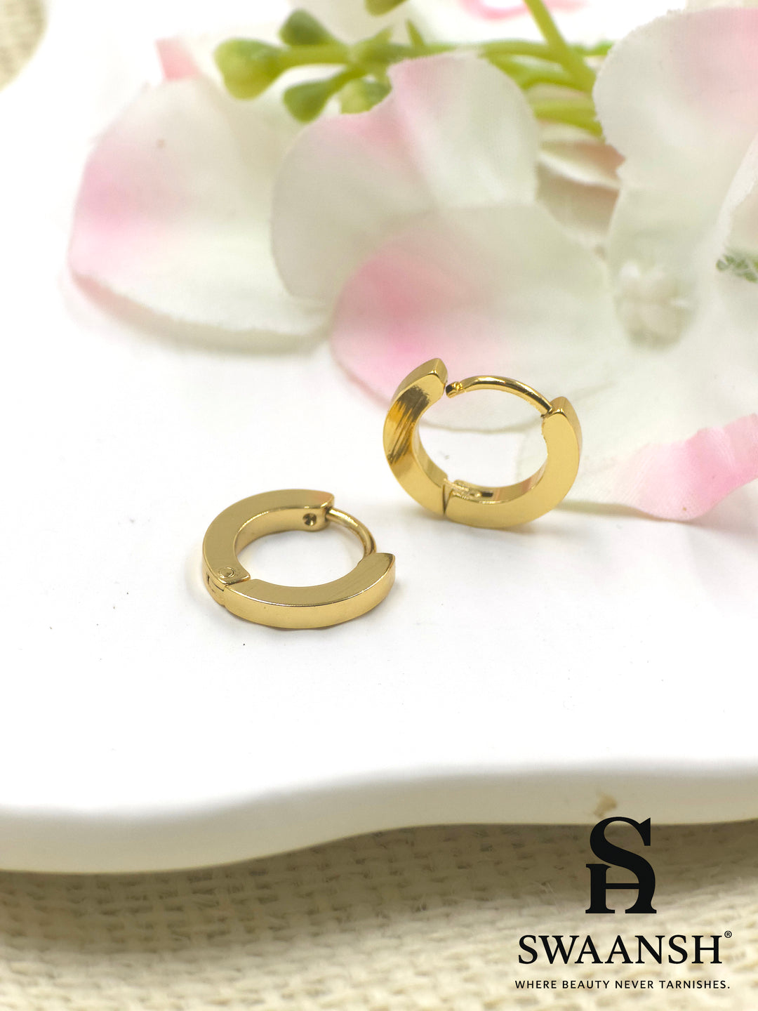 Core Loop gold hoop earrings by Swaansh with minimal design and anti-tarnish stainless steel finish