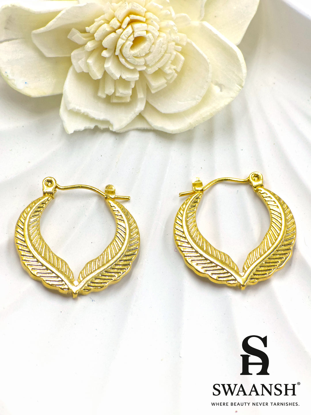 Feather Gleam earrings by Swaansh – textured gold leaf hoop earrings with elegant detailing and nature-inspired design