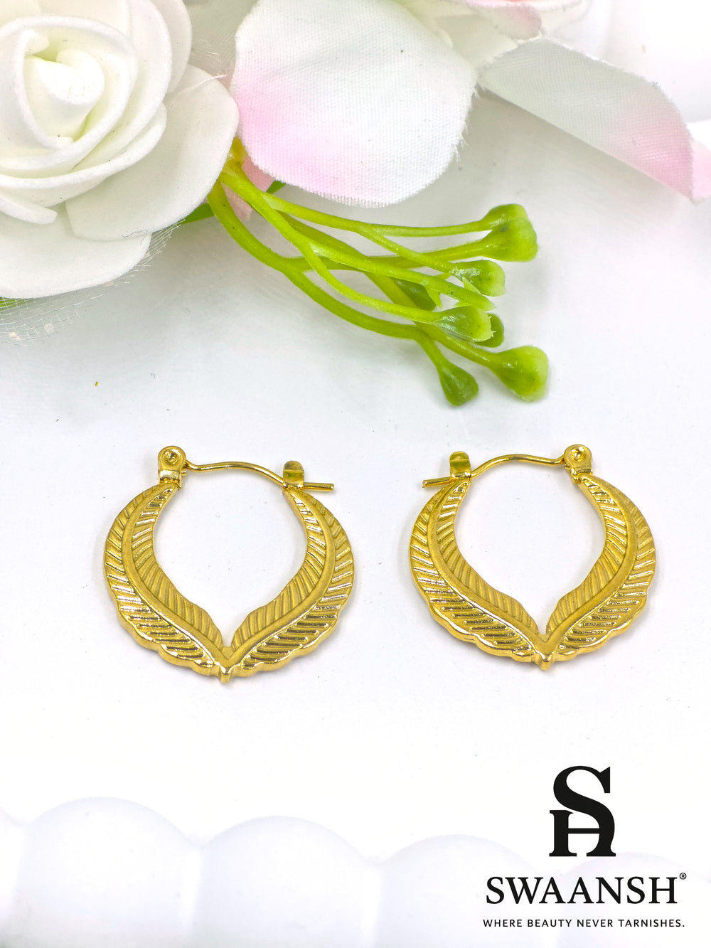 Feather Gleam earrings by Swaansh – textured gold leaf hoop earrings with elegant detailing and nature-inspired design