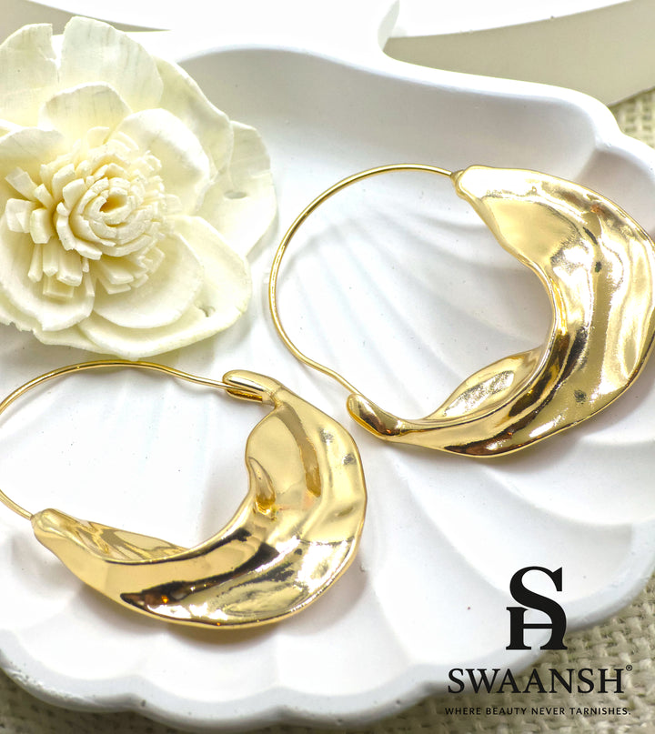 Swaansh Fluid Wave sculpted gold hoop earrings with bold organic design – skin-friendly and anti-tarnish jewellery for modern women