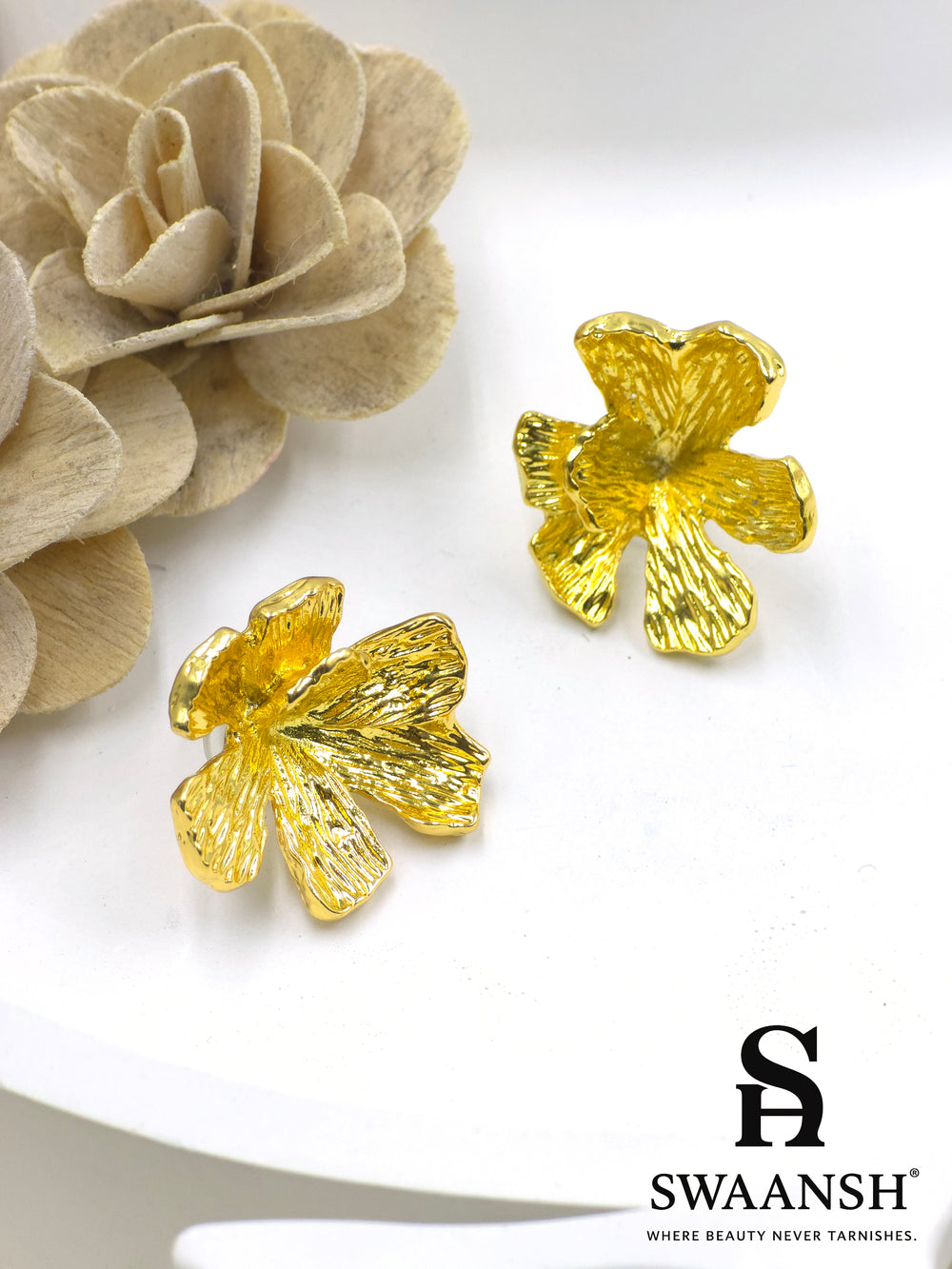 Golden sculpted floral earrings by Swaansh – bold, anti-tarnish statement jewellery for festive occasions