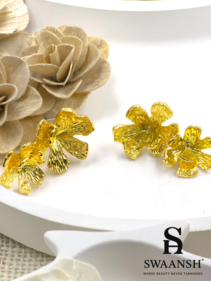 Golden sculpted floral earrings by Swaansh – bold, anti-tarnish statement jewellery for festive occasions