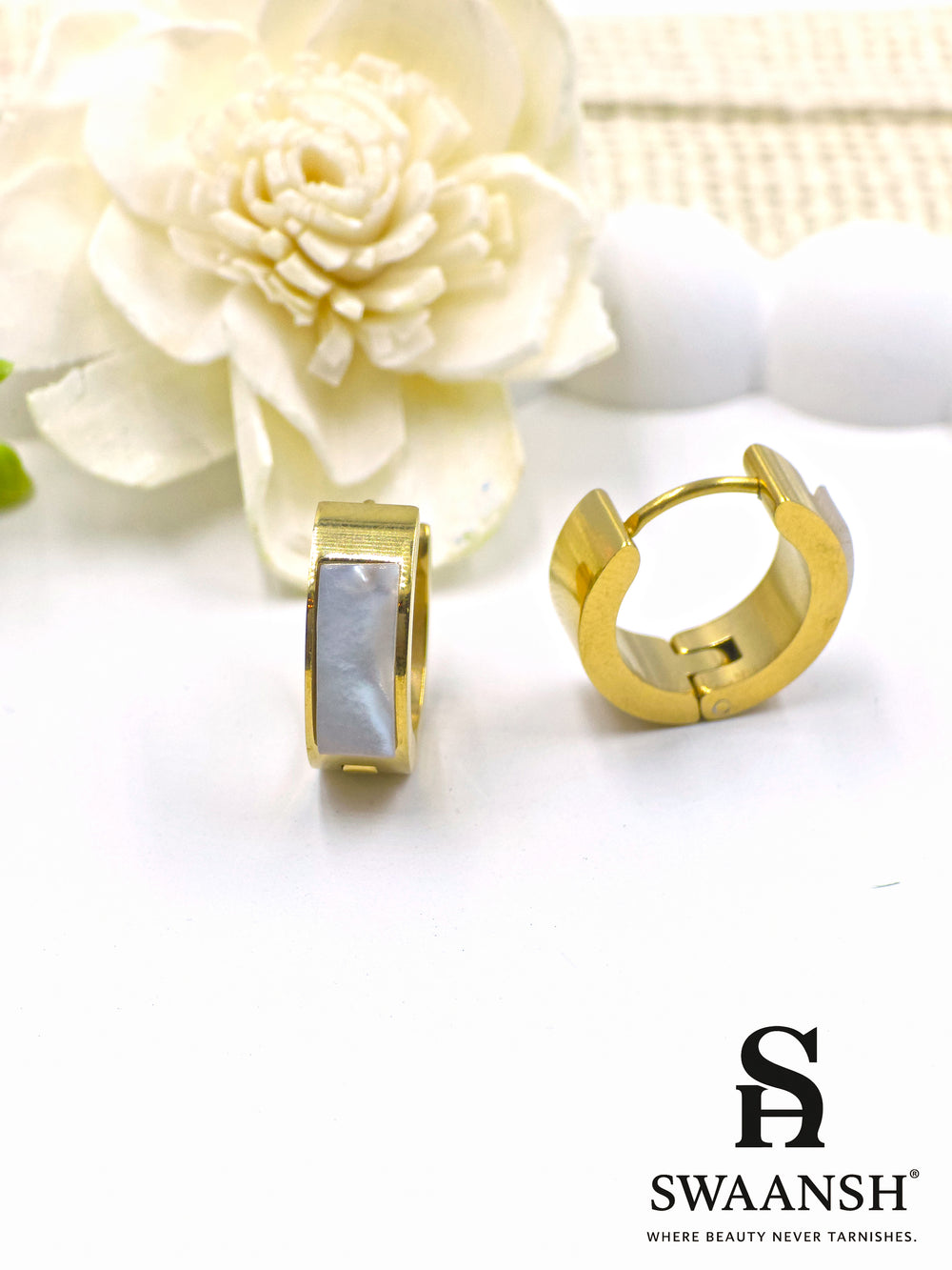Small gold hoop earrings with white pearl-effect inlay on a white background – Swaansh jewellery