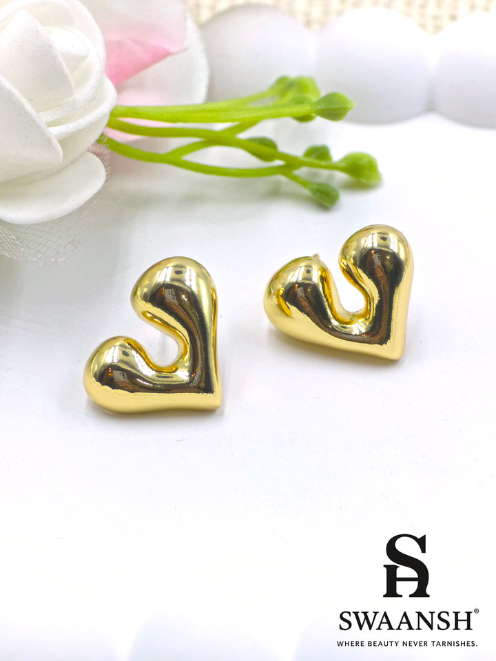 Gold melted heart-shaped stud earrings on white background – Swaansh 