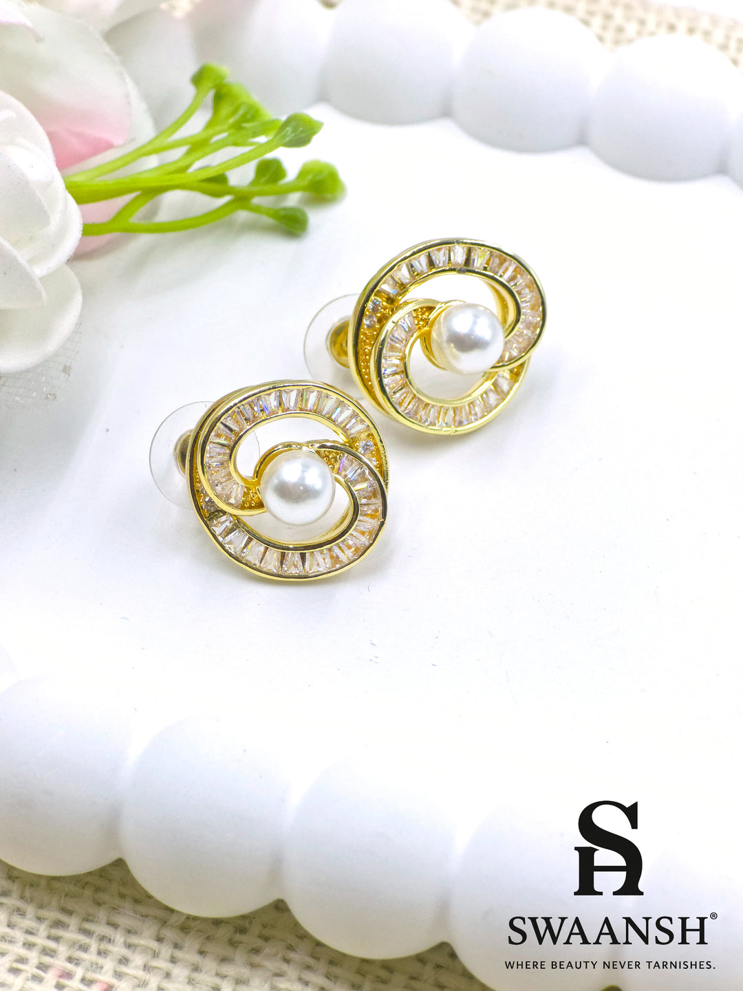 Swaansh  – round gold stud earrings with a central pearl and circular baguette crystal accents