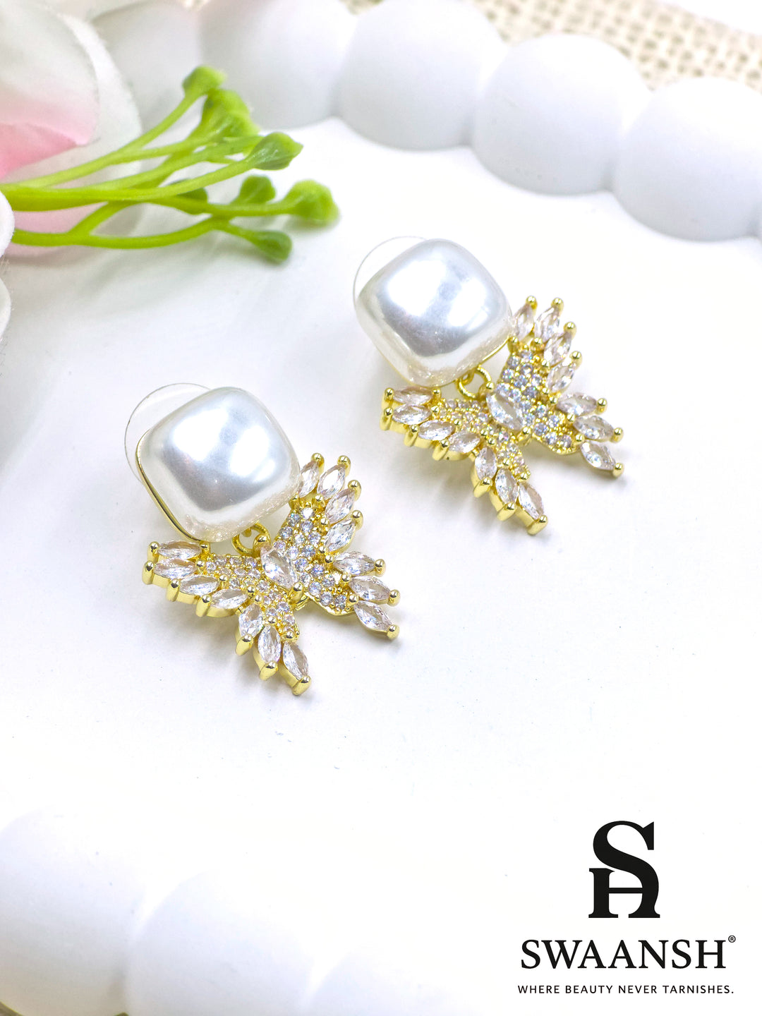 Swaansh  – square pearl earrings with crystal leaf drop design in gold finish