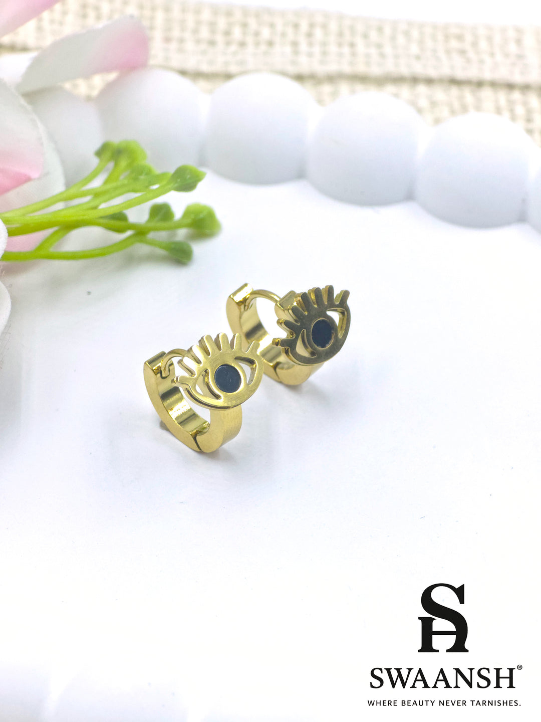 Swaansh Evil Eye gold hoops with black enamel protection design