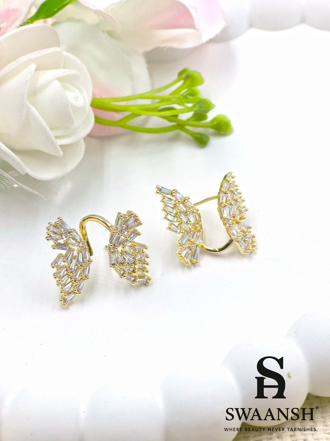 Gold ear crawler earrings with baguette-cut crystals in wing shape – Swaansh statement anti-tarnish cuffs