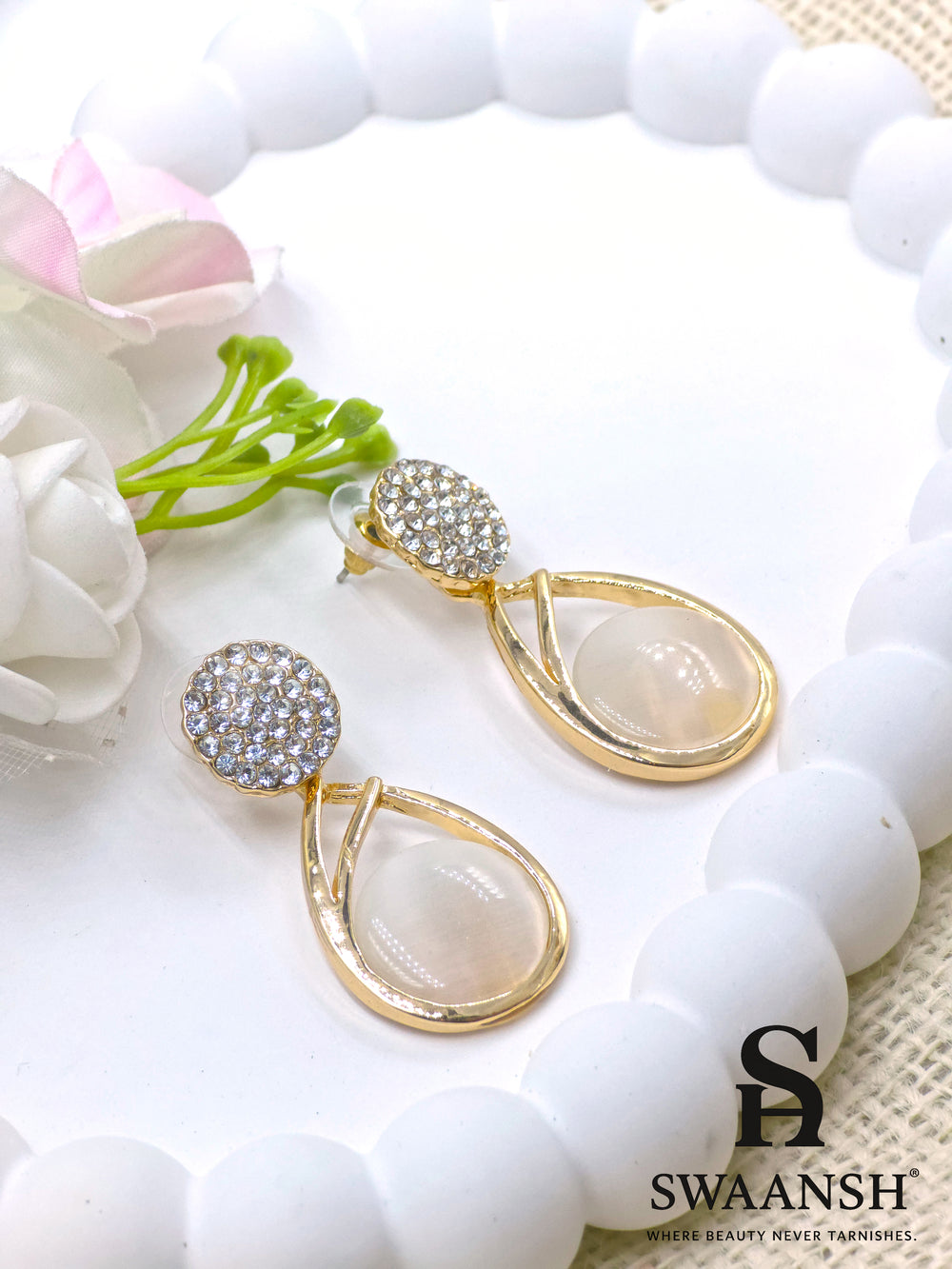 Gold teardrop dangler earrings with moonstone-inspired stone and crystal-studded round top – Swaansh premium jewellery