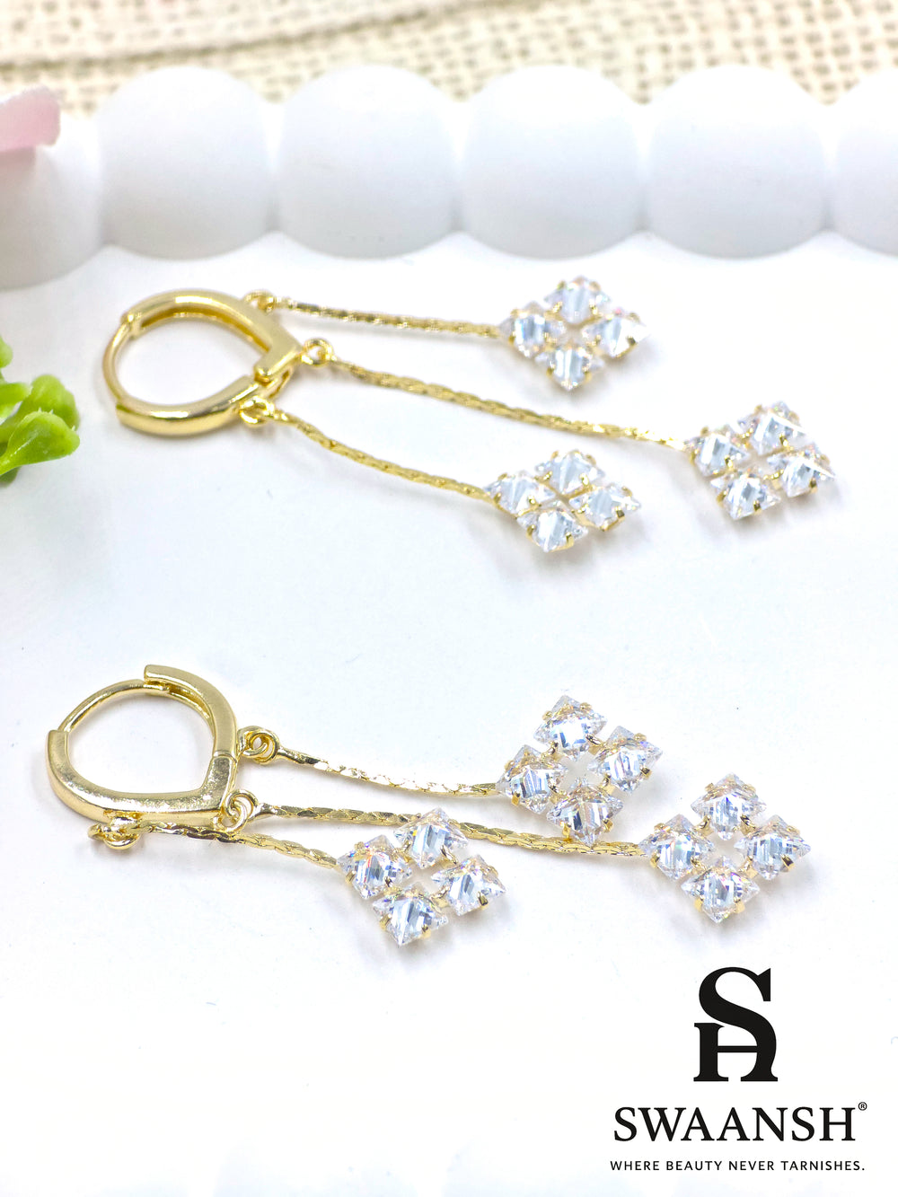 Twin crystal drop earrings with dual gold chains and square stone clusters – Swaansh
