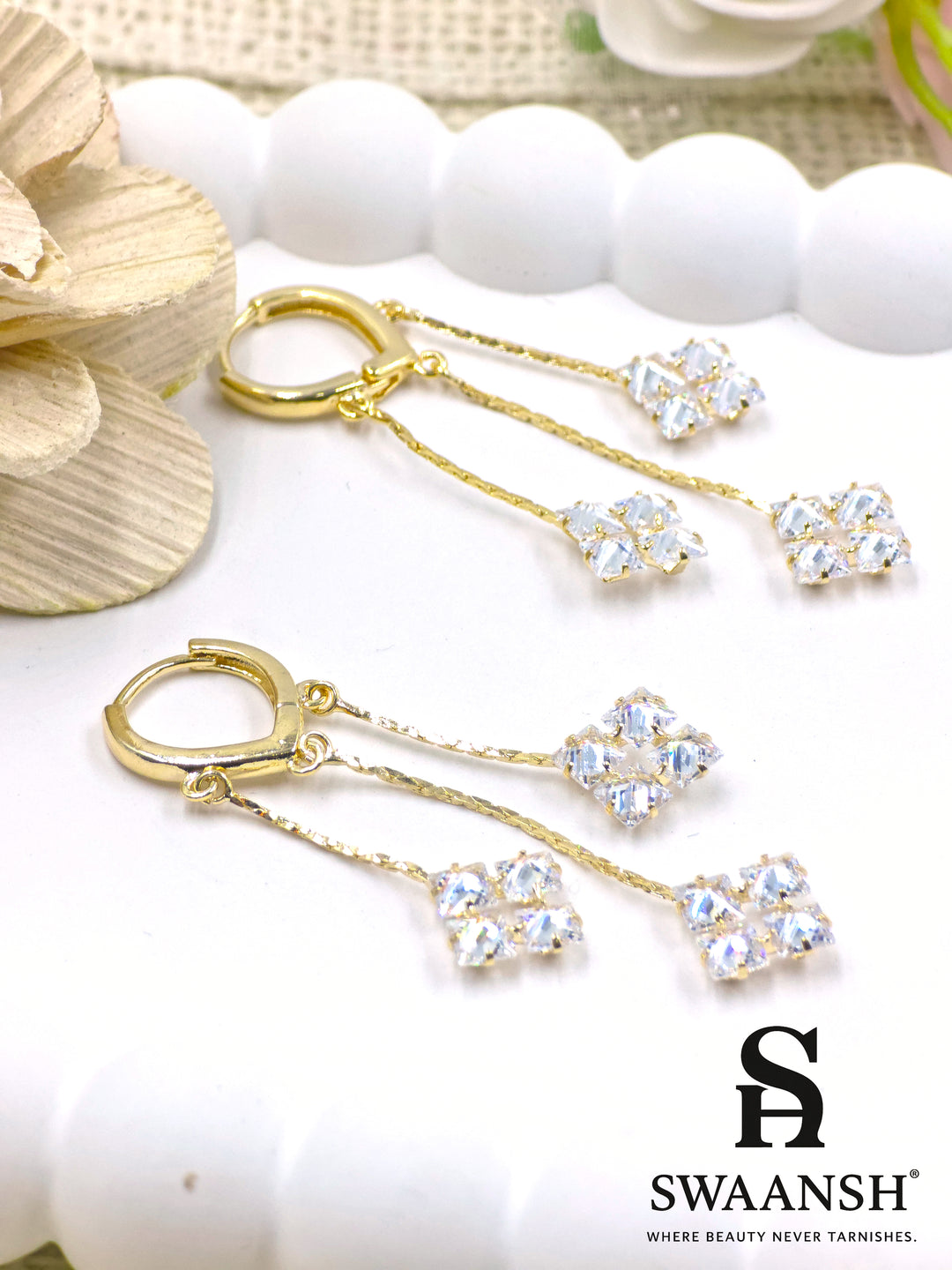 Twin crystal drop earrings with dual gold chains and square stone clusters – Swaansh