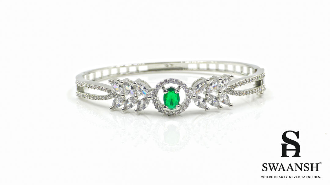 Silver anti-tarnish bracelet with emerald green centerpiece and marquise-cut side crystals – Swaansh