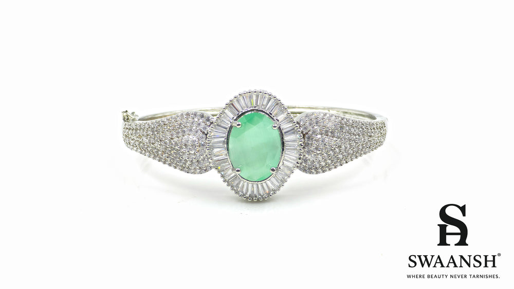 Silver-toned bracelet with oval green stone, surrounded by baguette-cut CZs – BPR111 anti-tarnish festive jewellery by Swaansh