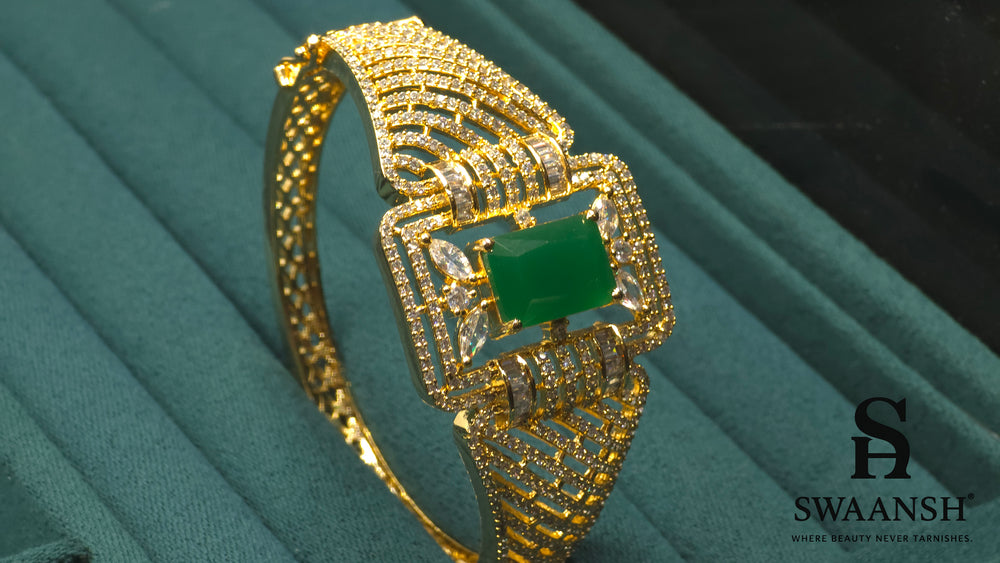 Gold bracelet with rectangular emerald green centre and structured CZ grid design – BPR114 luxury piece by Swaansh