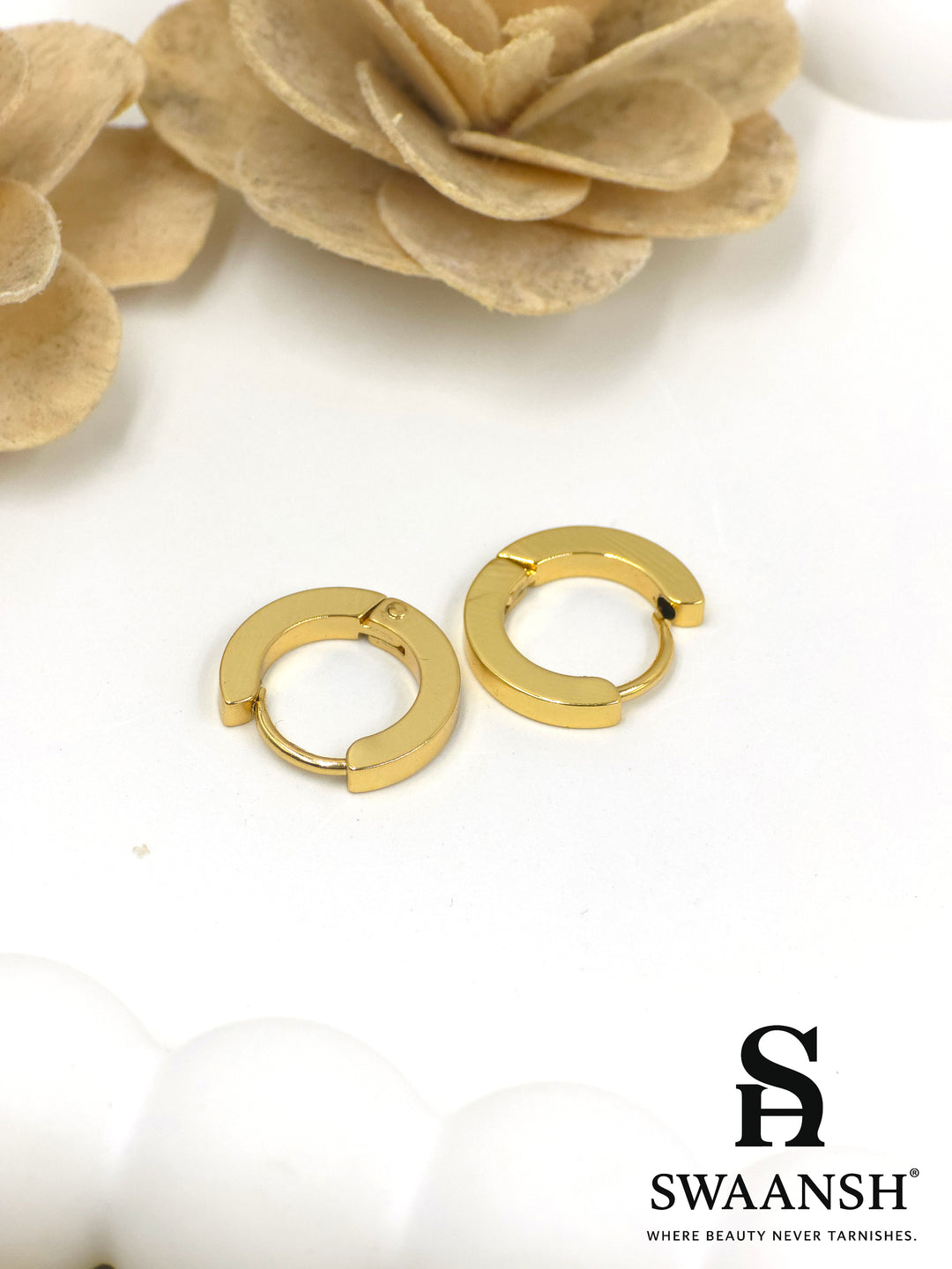 Core Loop gold hoop earrings by Swaansh with minimal design and anti-tarnish stainless steel finish