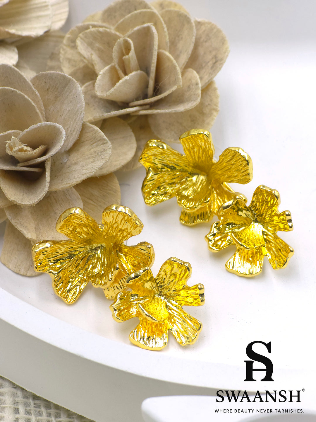 Golden sculpted floral earrings by Swaansh – bold, anti-tarnish statement jewellery for festive occasions