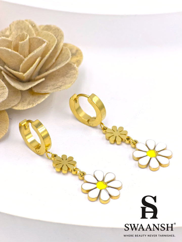 Gold hoop earrings with white and yellow enamel daisy charm – Sunny Daze Daisy Drop Earrings by Swaansh