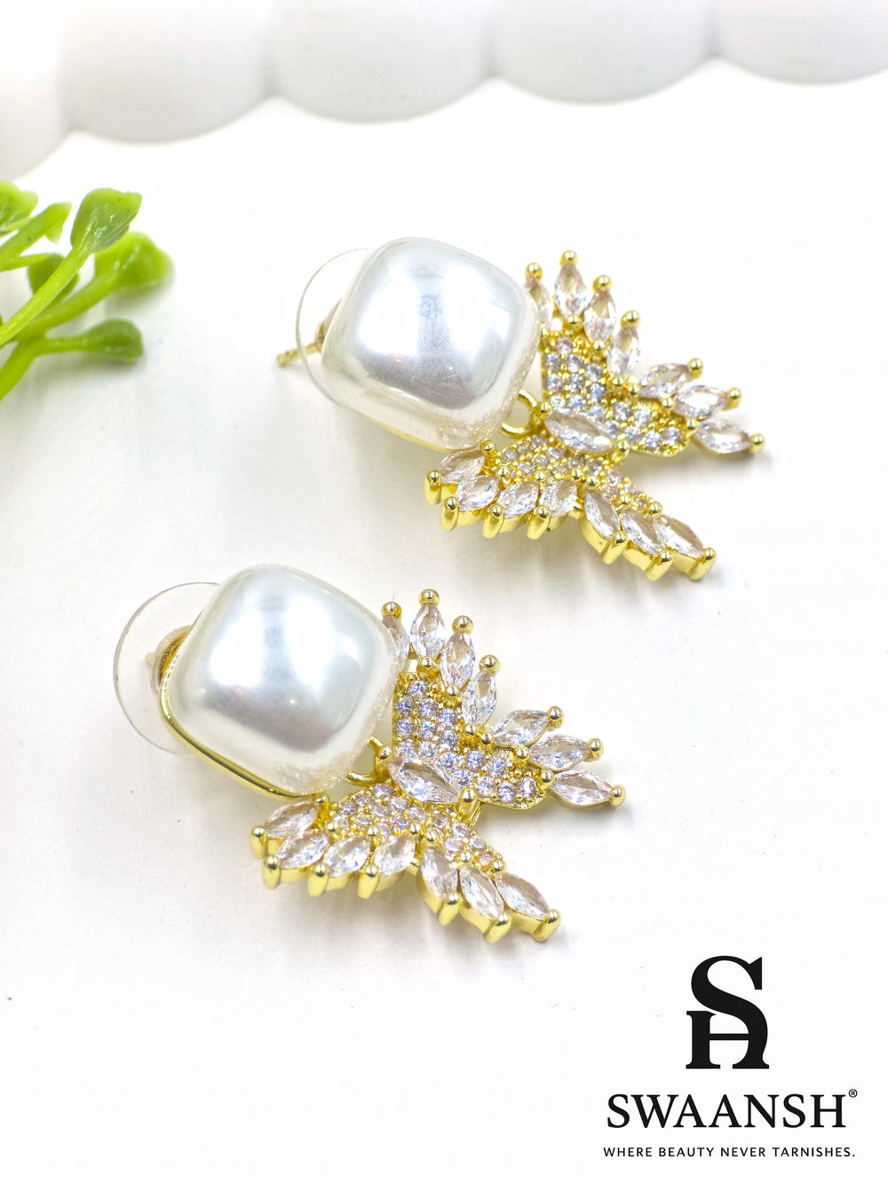 Swaansh  – square pearl earrings with crystal leaf drop design in gold finish
