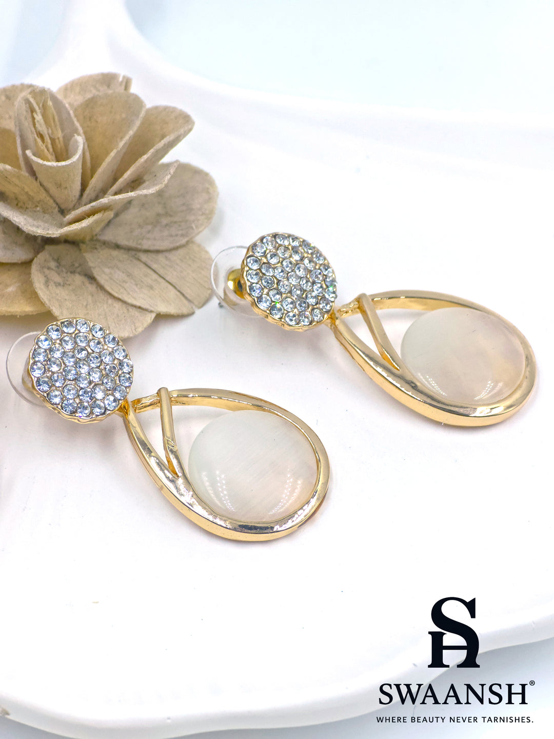 Gold teardrop dangler earrings with moonstone-inspired stone and crystal-studded round top – Swaansh premium jewellery
