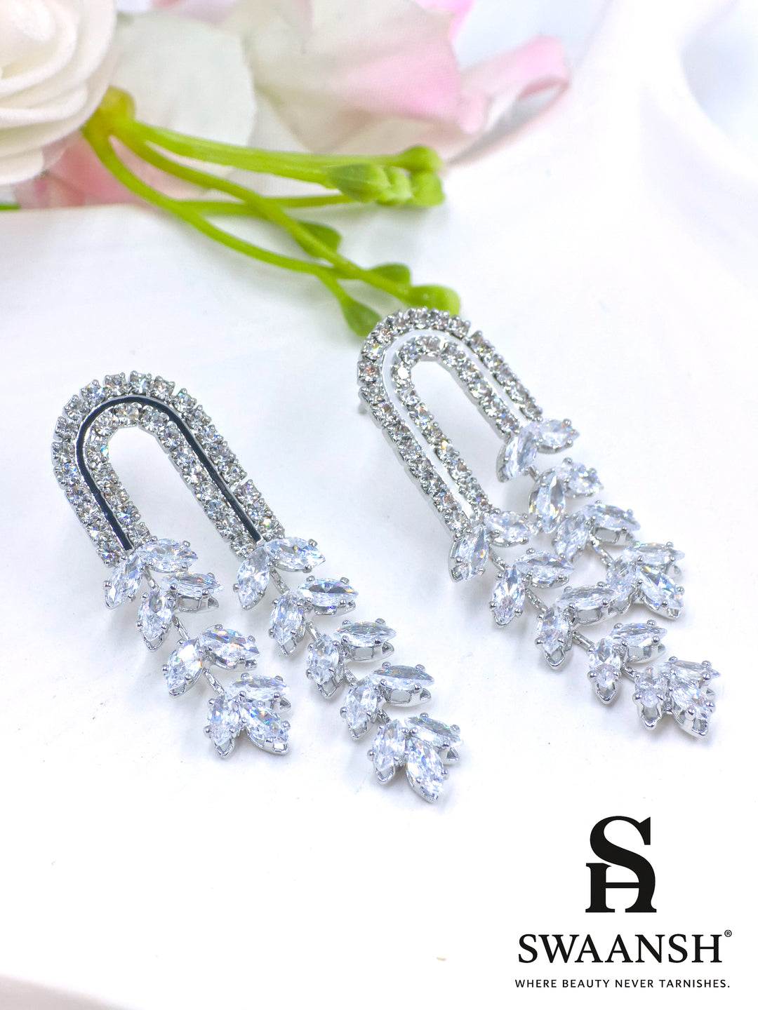 Silver U-shaped earrings with cascading marquise crystals and dual crystal arcs – Swaansh