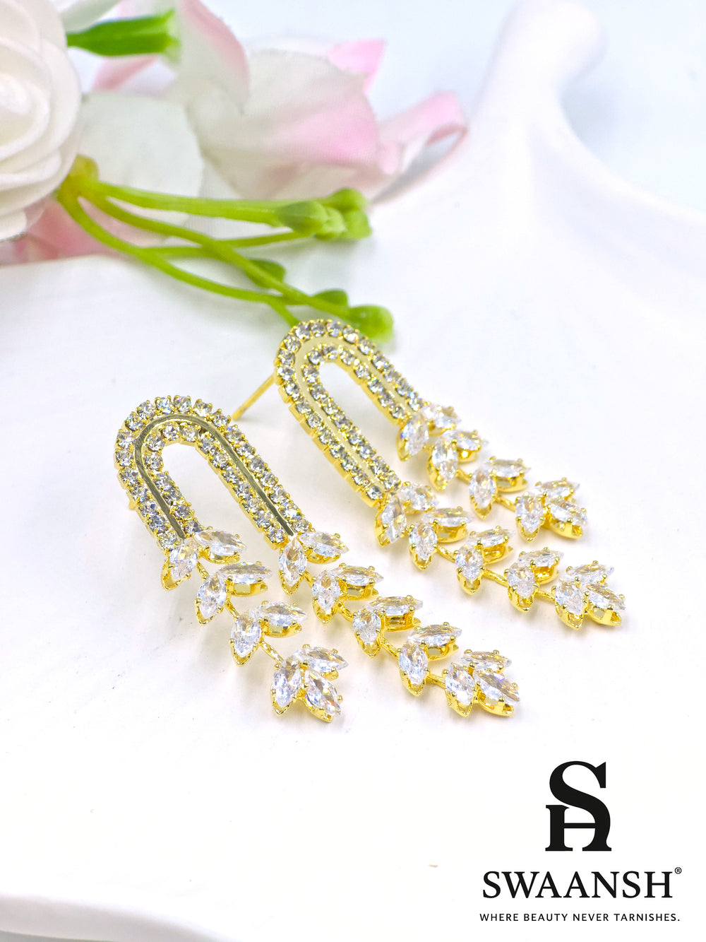 Gold U-shaped earrings with cascading marquise-cut crystal vines and twin crystal arcs – Swaansh