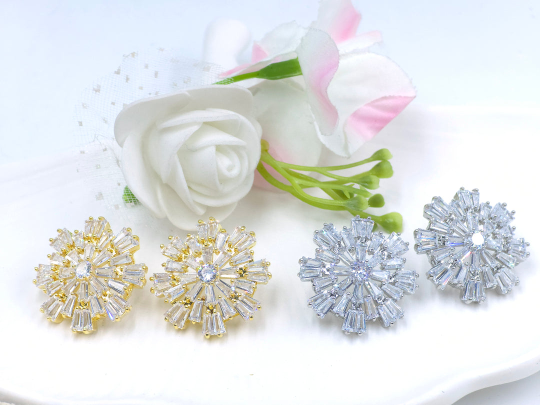 Silver starburst earrings with baguette zirconia and central solitaire – Swaansh