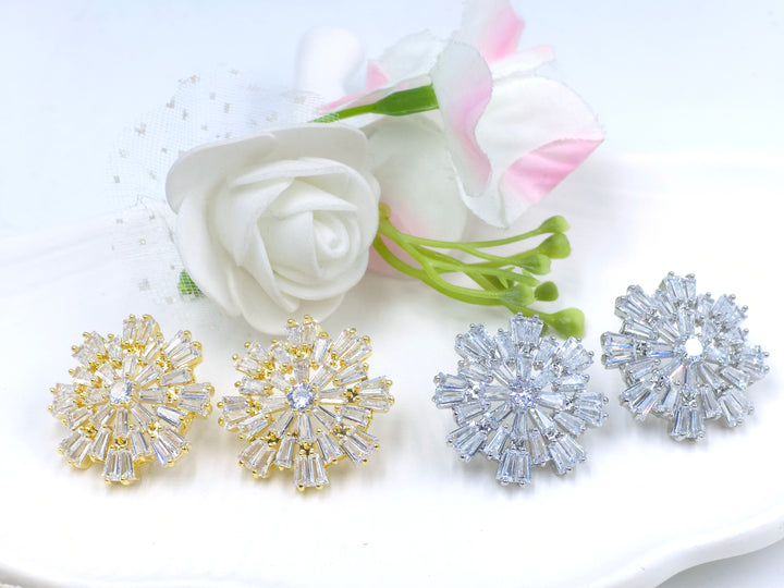 Silver starburst earrings with baguette zirconia and central solitaire – Swaansh