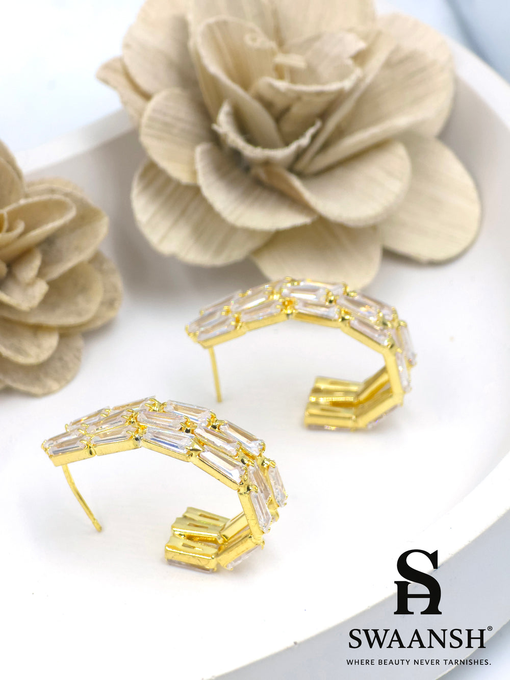 Gold angular hoop earrings with baguette-cut zirconia set in a step-like design – Swaansh