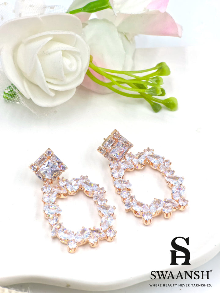 Rose gold drop earrings with princess-cut stud and marquise-framed design – Swaansh