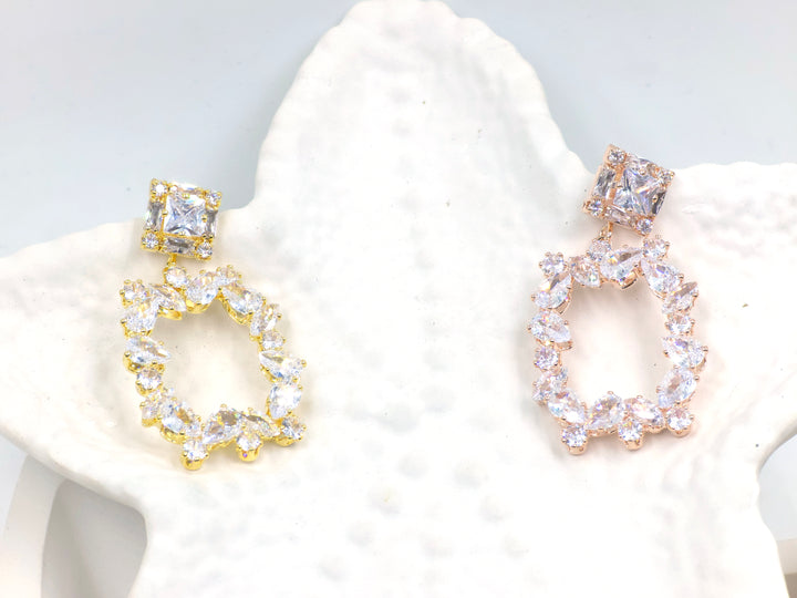 Rose gold drop earrings with princess-cut stud and marquise-framed design – Swaansh