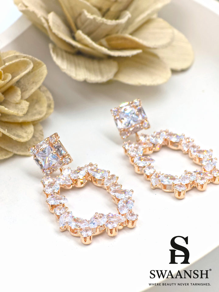 Rose gold drop earrings with princess-cut stud and marquise-framed design – Swaansh