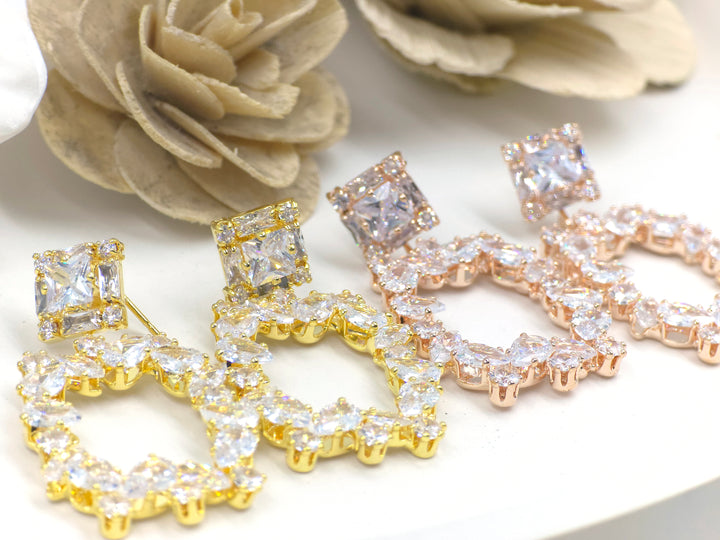 gold statement earrings, marquise crystal earrings, frame drop earrings, swaansh luxe earrings, anti-tarnish bridal jewellery, regal festive earrings, party wear accessories