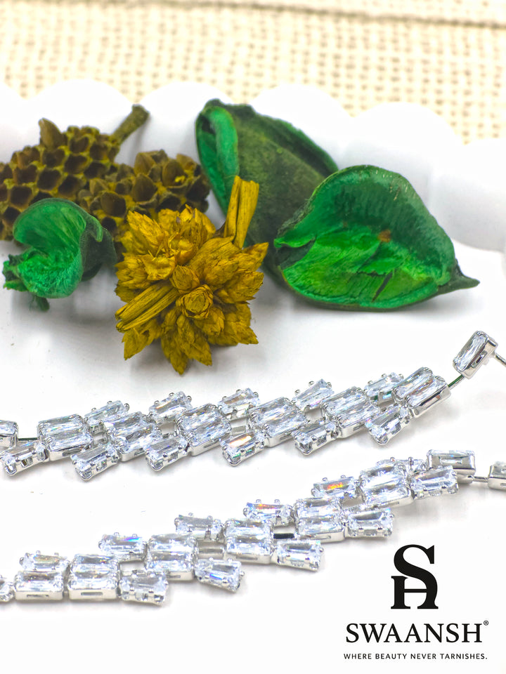 Silver stiletto-style long earrings with cascading baguette-cut zirconia – Swaansh