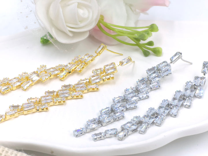 Silver stiletto-style long earrings with cascading baguette-cut zirconia – Swaansh
