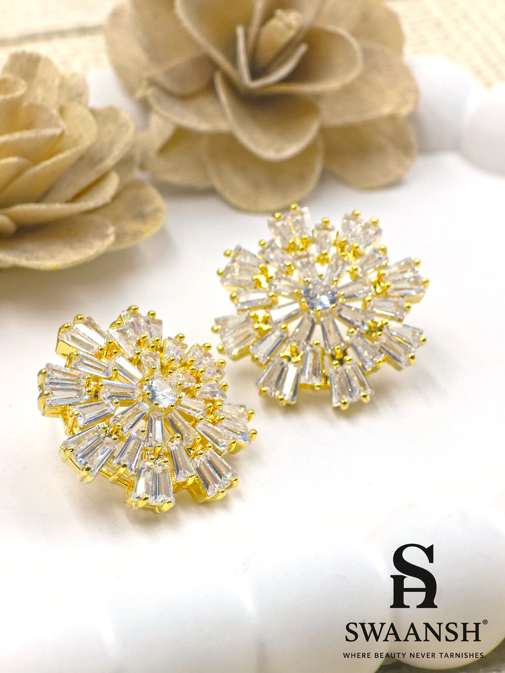 Gold burst earrings with baguette-cut zirconia and central round stone – Swaansh