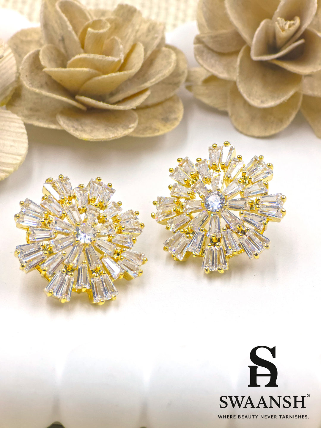 Gold burst earrings with baguette-cut zirconia and central round stone – Swaansh
